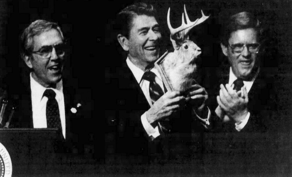 Ronald Reagan being presented with a mounted jackalope head in Rapid City, South Dakota, in 1986